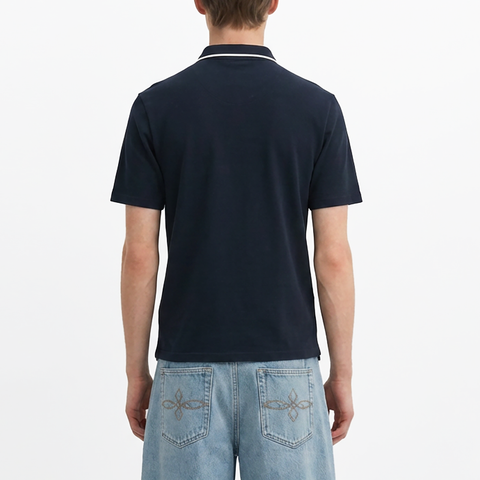 A male model wearing the Smith's 1906 MPO01 Navy Polo is showing the back.