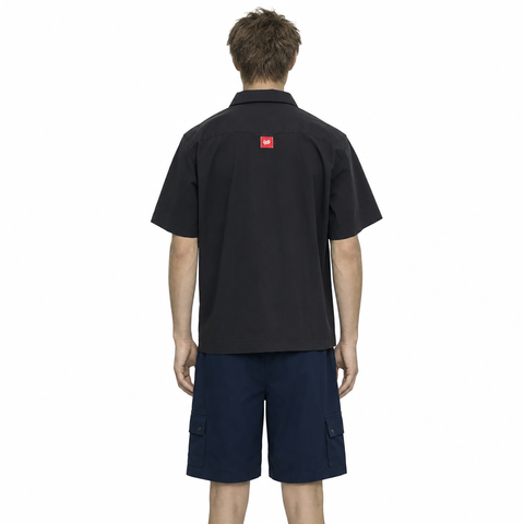 A male model wearing the Smith's 1906 MSR01 Black Short-Sleeve Shirt is showing the back.