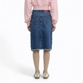 A female model wearing the Smith's 1906 WSK01 Blue Denim Skirt is showing the back.