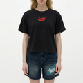 A female model wearing the Smith's 1906 WTE03 Black T-shirt is showing the front.