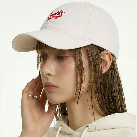 A female model wearing the Smith's 1906 UCP02 White Cap is showing the side view.