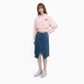 A female model is wearing a hoodie paired with the Smith's 1906 WSK01 Blue Denim Skirt.